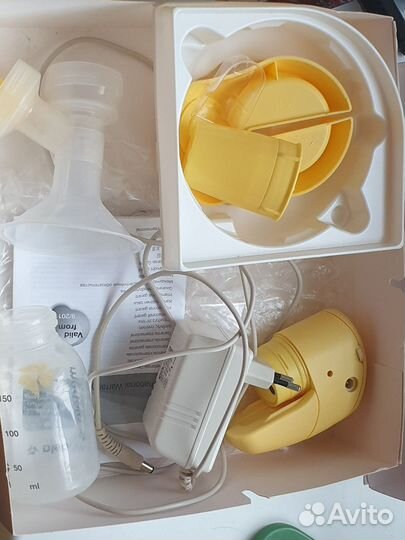 Молокоотсос medela электрический