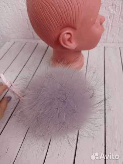 Помпон светло сиреневый из енота