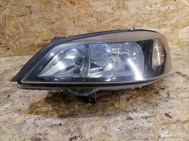 Фара левая Opel Astra G