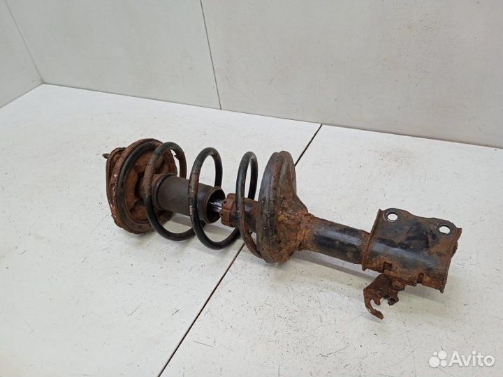 Амортизатор передний Mitsubishi Lancer 9 CS 1.6