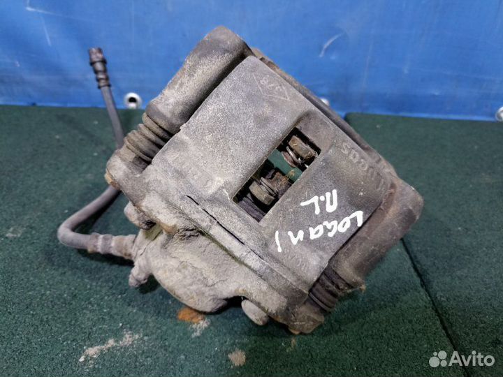 Суппорт тормозной передний левый Renault Logan 1