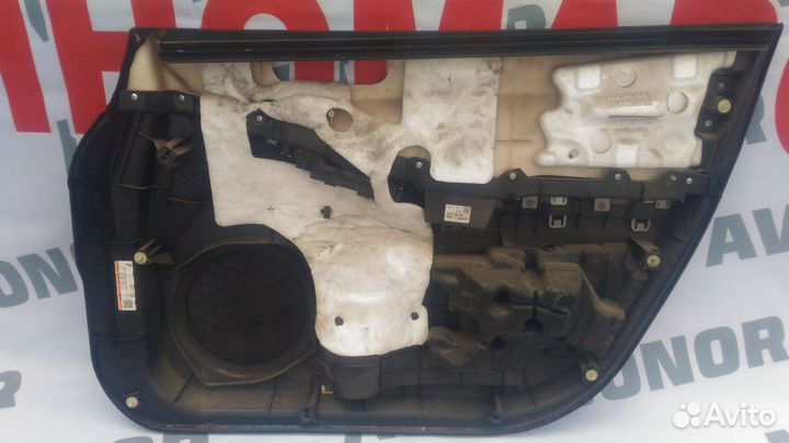 Обшивка двери Мазда сх 7