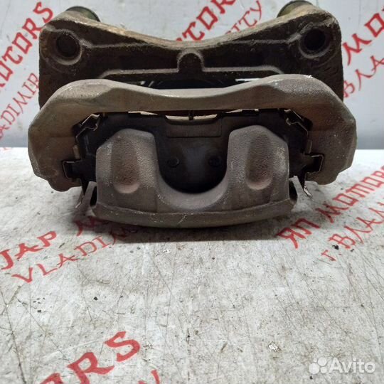 Суппорт тормозной передний левый Nissan Teana J32