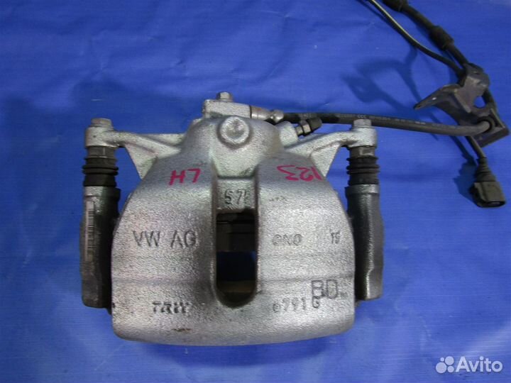 Суппорт тормозной передний левый Volkswagen Golf 7