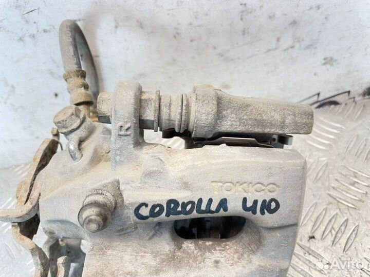 Суппорт тормозной задний правый Toyota Corolla