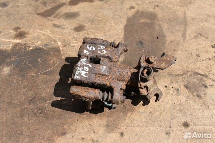 Суппорт тормозной задний левый Mazda 6 GH L813