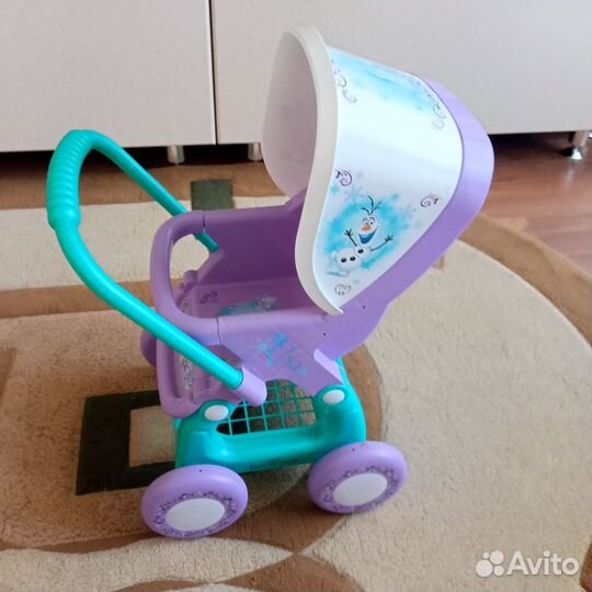 Детская игрушечная коляска