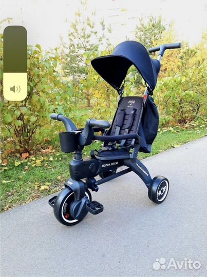 Трехколесный велосипед с ручкой