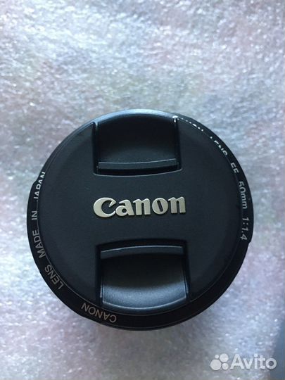 Новый. Canon 50mm 1.4