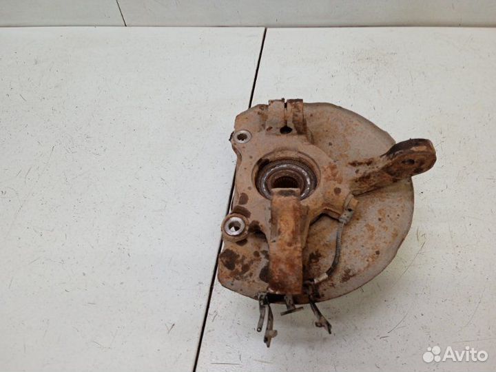 Кулак поворотный передний левый Mitsubishi Lancer