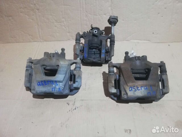 Суппорт тормозной Opel Astra J