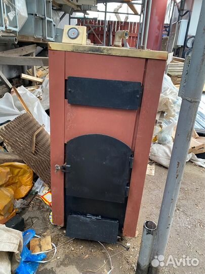Твердотопливный Котёл отопительный водогрейный