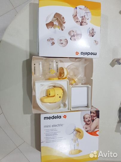 Молокоотсос medela электрический