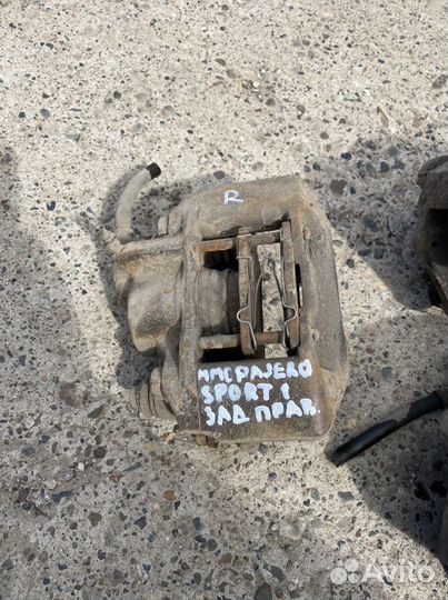 Суппорт тормозной pajero sport 1