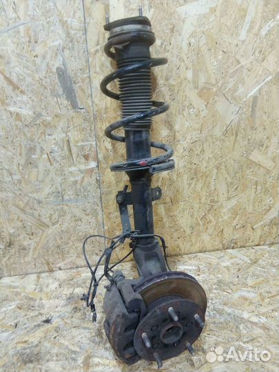 Стойка амортизатора передняя левая Ford Transit 7