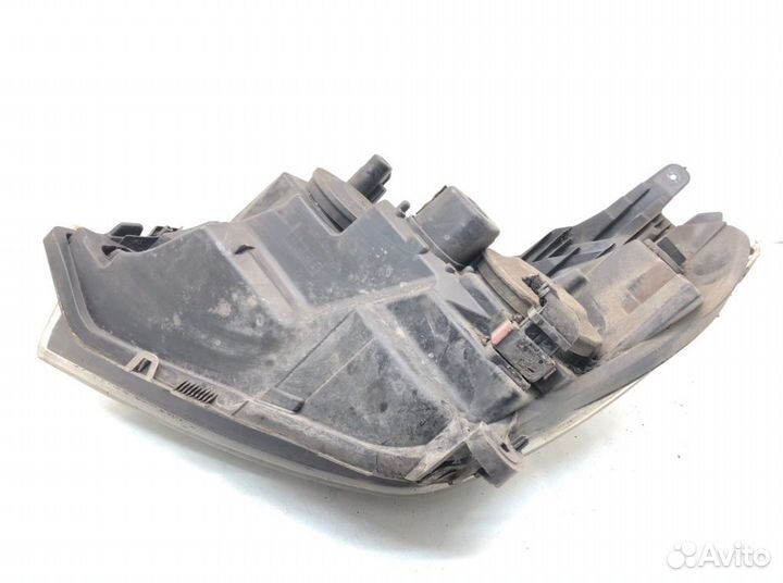 Фара 24451031 Opel Astra H (2004-2010)