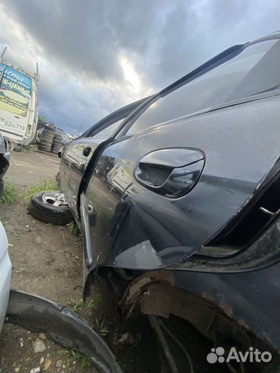 Задняя левая дверь Kia Spectra