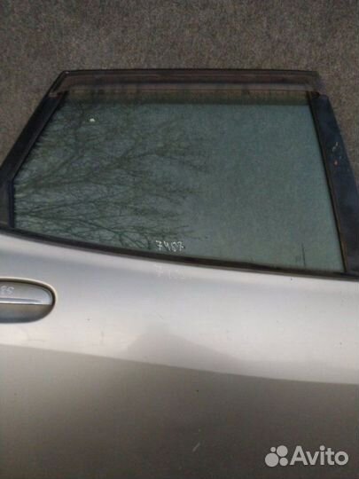Стекло заднее правое Toyota Duet M100A EJ 1999