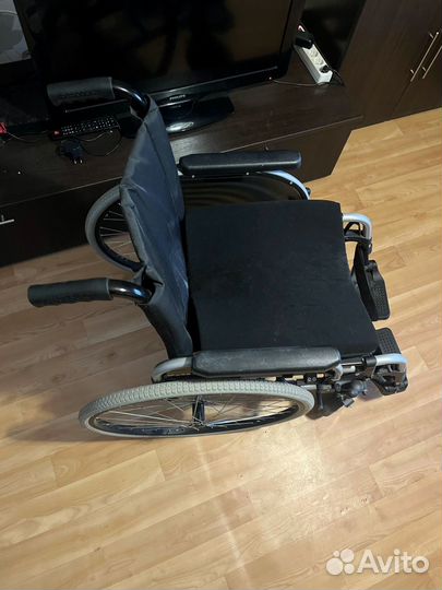 Инвалидная коляска