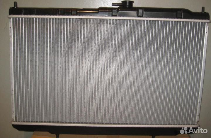 Радиатор охлаждения Nissan Almera