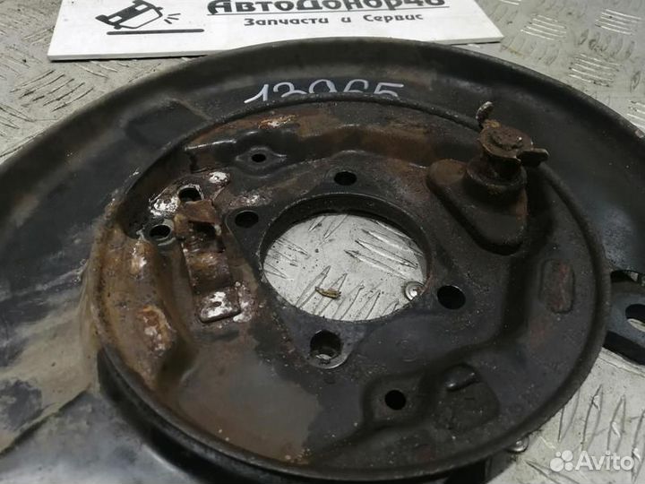 Пыльник тормозного диска задний левый Tiida C11