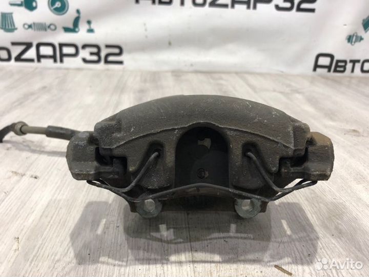 Суппорт тормозной передний левый Volkswagen Polo 6