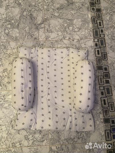 Позиционер для новорожденных