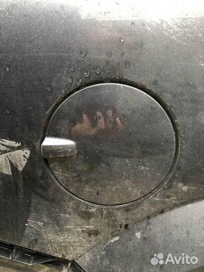 Лючок бензобака (Opel Astra)