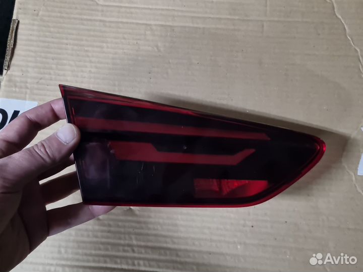 Фонарь левый в крышку багажника Volkswagen Polo