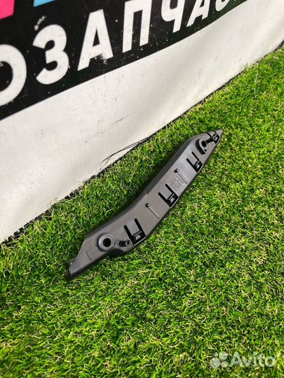 Кронштейн крепления бампера переднего правый Tesla