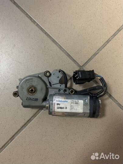 Моторчик от люка bmw e34