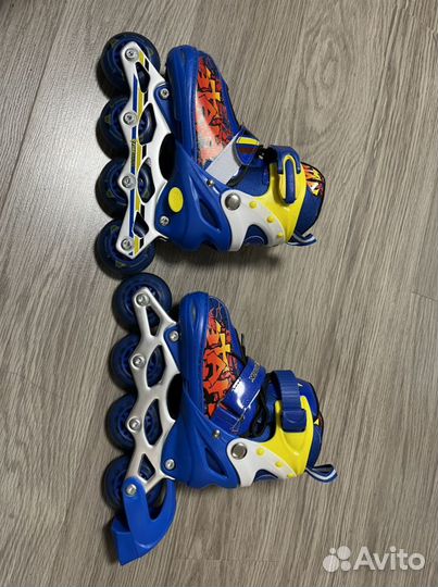 Роликовые коньки