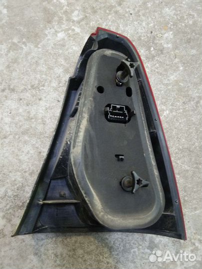 Фонарь задний левый Рено Логан фаза 1