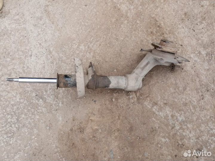 Амортизатор передний левый Daewoo Nexia 100 F16D3