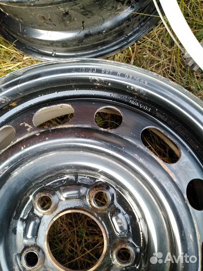 Диски Mazda 3 c колпаками