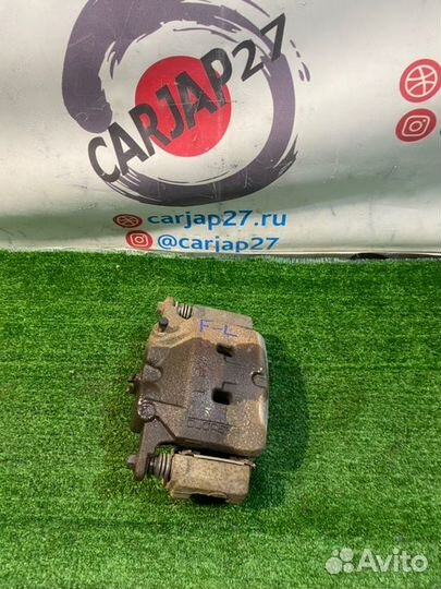 Суппорт тормозной (9) передний левый Nissan