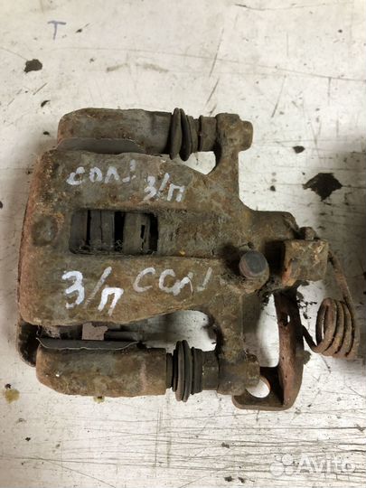 Задний тормозной суппорт Hyundai Solaris 1