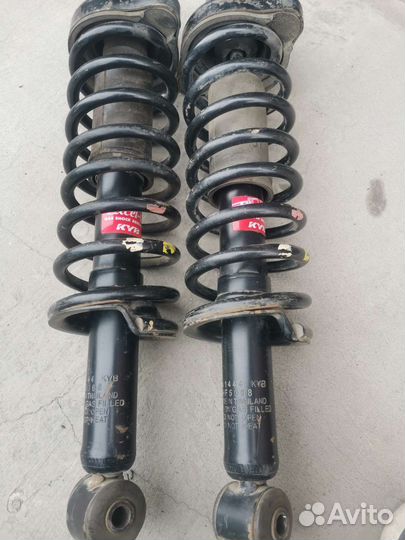 Стойки амортизатора Митсубиси Лансер Х
