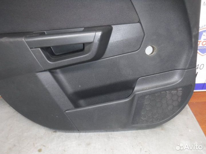 Обшивка двери задняя левая Opel Astra H Z18XER