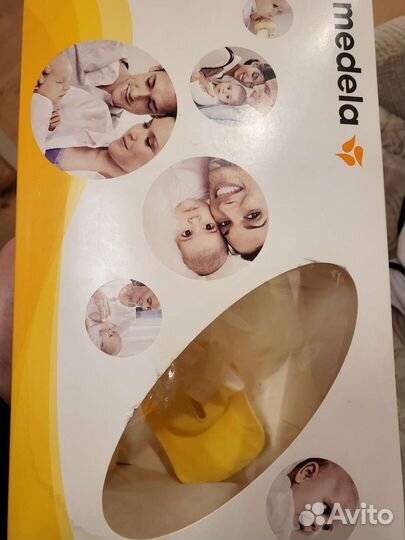 Молокоотсос ручной и пакеты для грудного молока