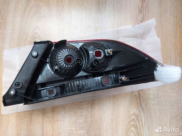 Фонарь левый новый неоргинал Mitsubishi Lancer IX