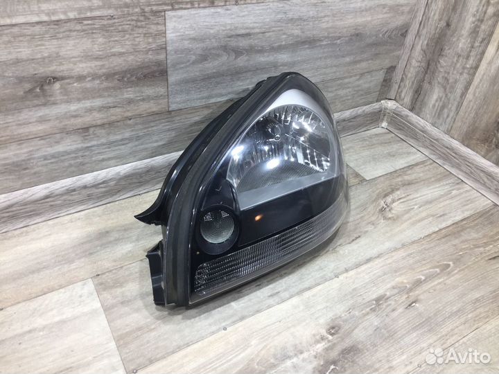 Фара левая Hyundai Tucson 1 (04-10) Хендай Туксон