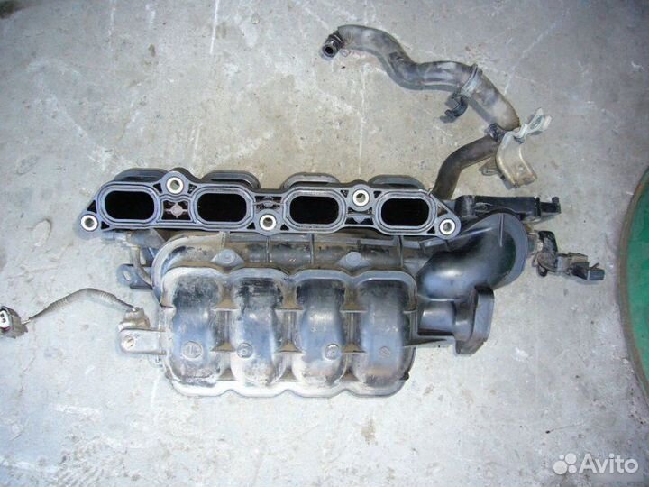Коллектор впускной Toyota Corolla E150 1nrfe 2011