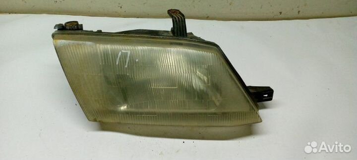 Фара передняя правая Mazda Familia универсал 1.8