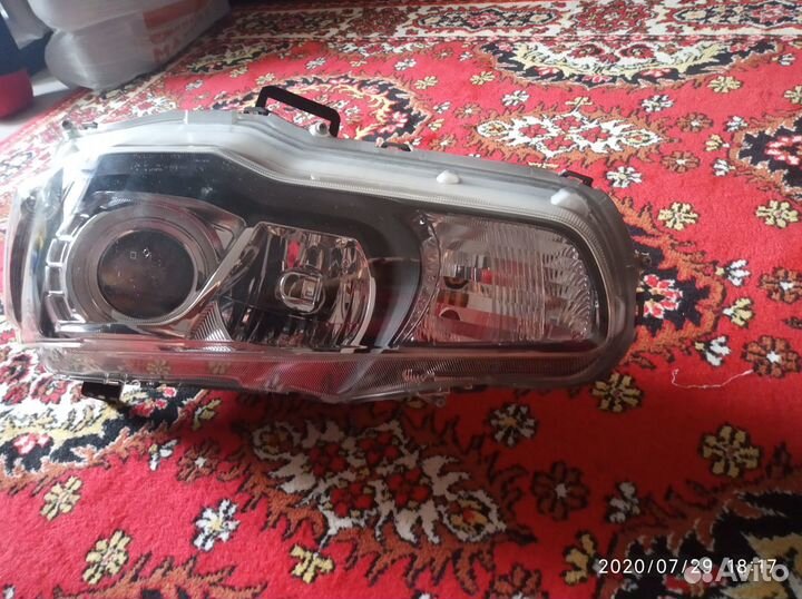 Левая фара Lancer 10