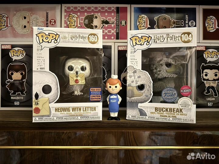 Hedwig with letter 160, Buckbeak 104. Funko Pop