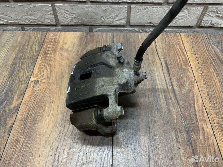 Kia Mohave Суппорт тормозной задний LH RH