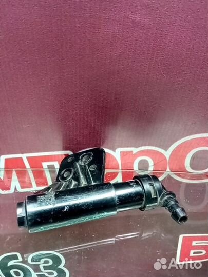 Форсунка омывателя фары передняя Kia Sportage