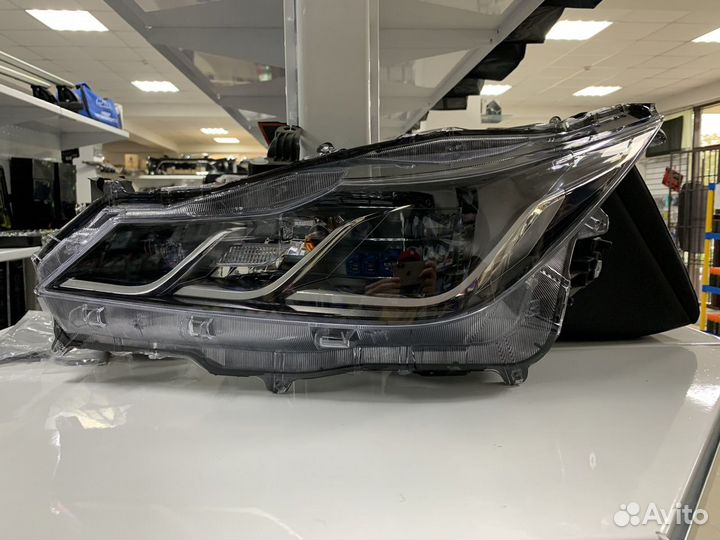 Фара Toyota Corolla E210