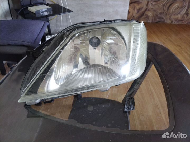Фара левая Logan I